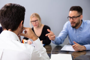 Blindsiding a worker into a redundancy meeting is not “reasonable management action”